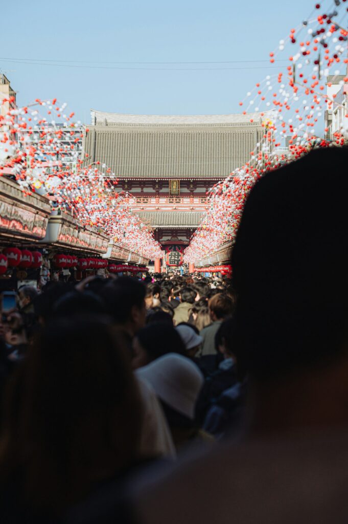 Tourists in Japan where travel insurance coverage varies